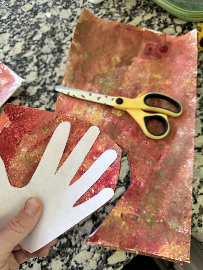 This image has an empty alt attribute; its file name is fall-handprint-craft-768x1024.jpg